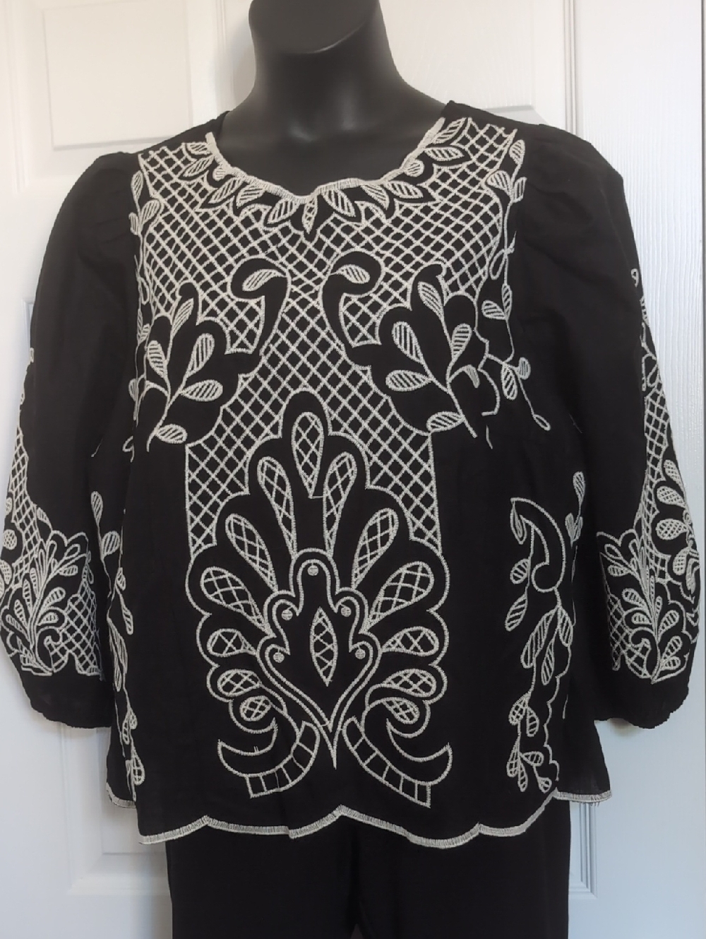 Cato Black Blouse with White Embroidered Folk Design